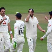 England's James Anderson (left) celebrates with his team-mates after taking the wicket of Pakistan's Naseem Shah during day three of the Third Test match at the Ageas Bowl, Southampton.