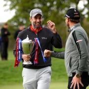 England's Richard Bland is greeted by Danny Willett after winning the Betfred British Masters at The Belfry, Sutton Coldfield. Picture date: Saturday May 15, 2021. PA Photo. See PA story GOLF British. Photo credit should read: Tim Goode/PA