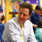 Nick Clegg chats with 11-year-old Paul Harrison on a visit to the children's cancer ward