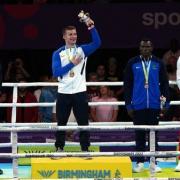 Wales' Bevan Taylor, silver, Scotland's Sean Lazzerini, gold, Tanzania's Yusuf Lu Changalawe, bronze and England's Aaron Bowen, bronze after the Men's Light Heavy 75-80kg boxing at The NEC on day ten of the 2022 Commonwealth Games in