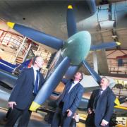 Defence Secretary Liam Fox, centre, at the Solent Sky Museum with Cllrs Royston Smith, left, and Jeremy Moulton.
