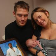 HAPPY FAMILY: Gary Shears and Jet Charman with baby James, named after Gary’s brother Jim.