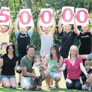 Families, friends and well-wishers at Moorgreen Farm, West End, celebrate reaching the 50,000 signature mark