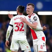 Jan Bednarek (right) and James Ward-Prowse celebrate after the Premier League match at Stamford Bridge, London. Photo: PA