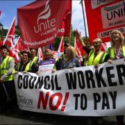 Council workers march against the pay cuts