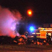 Arsonists torch mountain of rubbish
