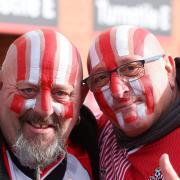 Fans during the Championship match between Southampton and Huddersfield Town at St Mary's Stadium. Photo by Stuart Martin.