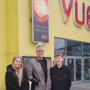 Holly, Jeana, and Isaac Palmer outside Vue