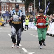 Batman and Robin run a previous ABP Southampton Marathon