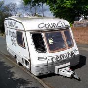 ‘It’s an eyesore’: Abandoned caravan graffitied having yet to be removed by the council