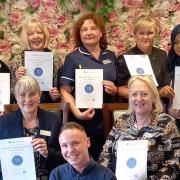 Southampton Manor Care Home staff are all smiles with their certificates from Carehome.co.uk