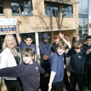 Head teacher Ruth Evans and pupils at Cantell School celebrate their Ofsted report.