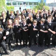 Pupils and head teacher Ewan Scott celebrate Chamberlayne College of the Arts' Ofsted success.