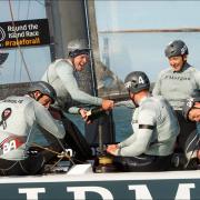 Ben Ainslie celebrates breaking the record with his crew.