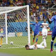 Mario Balotelli celebrates his winning goal