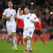 Wayne Rooney celebrates his match winning penalty last night