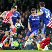 Shane Long in the thick of the action during Southampton's 1-1 draw at Chelsea