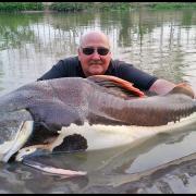Echo correspondent Mark Simmonds with his monster Amazon Red Tail