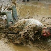 Mud is a frequent feature of Isle of Wight Festival (photo from 2011)