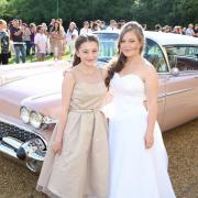 Sports cars and vintage rides ferry students to Prom