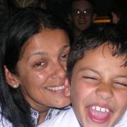 TERROR ATTACKS: Tasneem Jeevanjee, above with son Adam, was inside the Taj Mahal Hotel at the time of the attack.