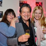 Gemma Elliott (right) and Estelle Elliott are pictured getting close-up with actor Patrick Mower, who plays Rodney Blackstock in Emmerdale.