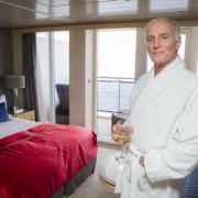 Rescued yachtsman Mervy Wheatley aboard the Queen Mary 2