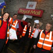 RELY ON US: Posties Kerry Fuller, Keith Cole, Alex Vale, depot manager Paul Farthing and Tom Adamson.