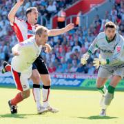 SCOW SCORES: Jamie Scowcroft completes his treble at St Mary’s in August 2007.
