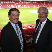 Mervyn King (right) at St Mary's Stadium with Bank of England Agent Chris Piper