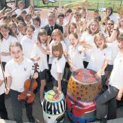 Head teacher Matthew Longden with the Toynbee school band, who are off to Germany