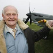 Dr Gordon Mitchell son of R.J. Mitchell with the plane his father designed