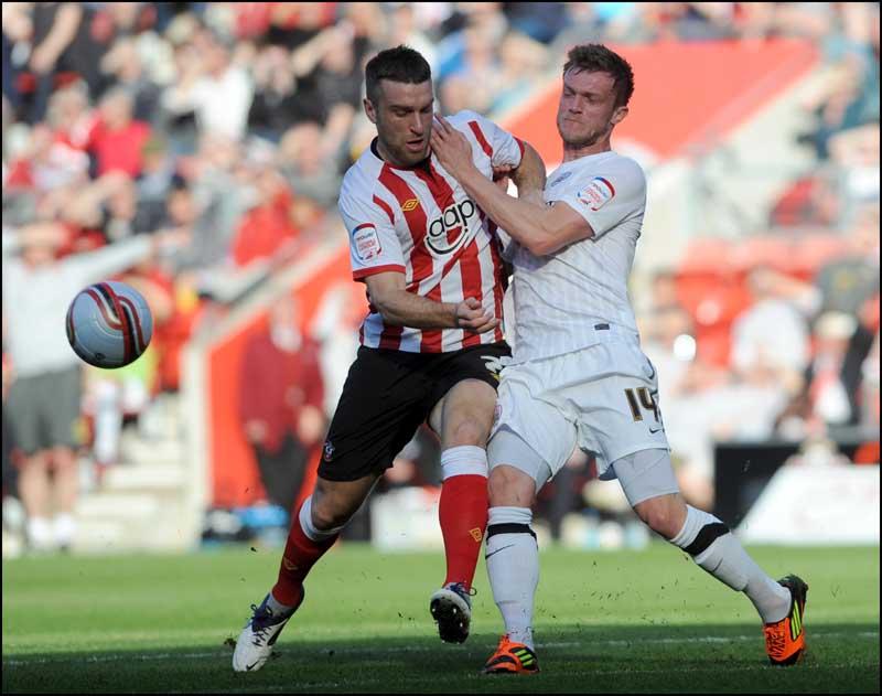 Images from the npower Championship match between Saints and Barnsley at St Mary's Stadium. The unauthorised downloading, editing, sale or distribution of this image is strictly prohibited. 