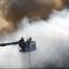 Fire crews fight the blaze in the docks.