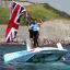 Luke Patience and Stuart Bithell celebrate winning the silver medal in the men's 470 class