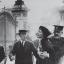 Emmeline Pankhurst being arrested outside Buckingham Palace during a protest.