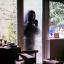 Mohammed Islam is caught on camera looking through the window