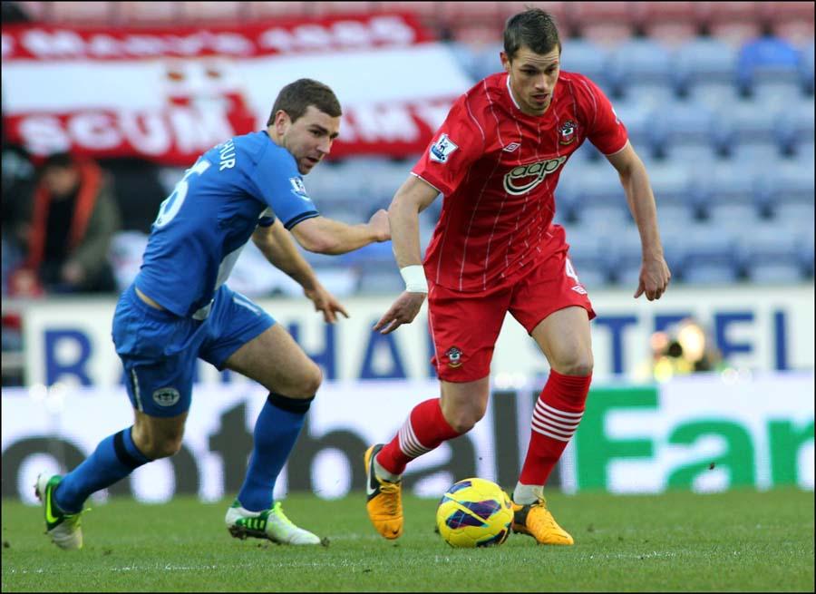 Images from the Premier League match between Wigan Athletic and Saints. The unauthorised downloading, copying, editing, or distribution of this image is strictly prohibited.