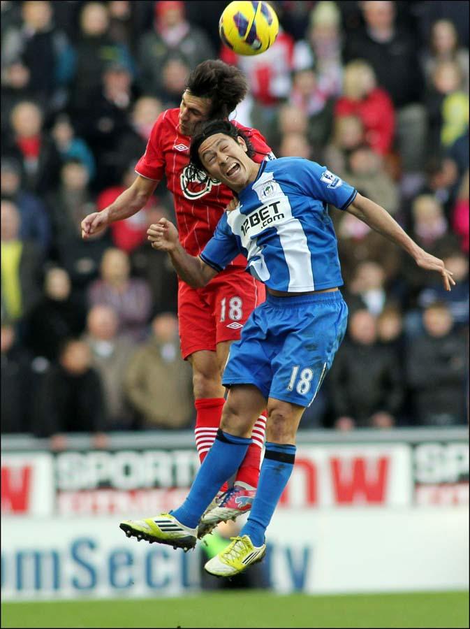 Images from the Premier League match between Wigan Athletic and Saints. The unauthorised downloading, copying, editing, or distribution of this image is strictly prohibited.