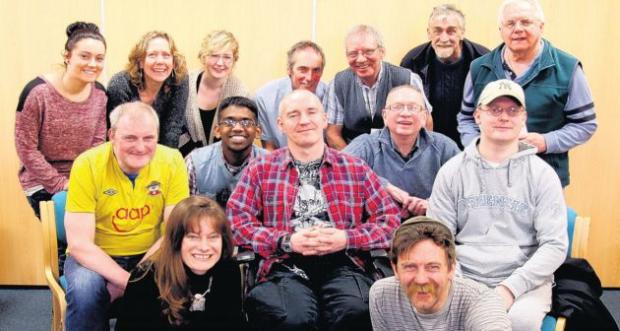 The Biscuit Poets with Headway volunteers and performance poet Jonny Fluffypunk, front right