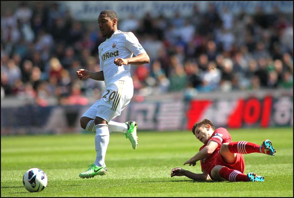 Photos from the Barclay's Premier League clash between Swansea City and Saints at the Liberty Stadium. The unauthorised downloading, copying, editing, or distribution of this image is strictly prohibited.