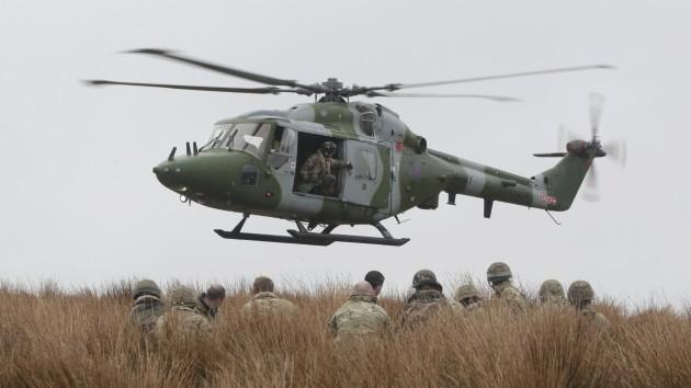 A helicopter near Braid Fell in Scotland, ahead of Exercise Joint Warrior.
Picture date: Thursday April 25, 2013. British and French troops prepared for an international military test today. They practised their Ãtheatre entry phaseÃ of Exercise Jo
