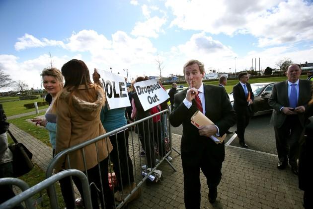 Students protest against the threat of emigration and lack of future employment prospects by turning their back on Taoiseach Enda Kenny, who is seen gesturing towards them, outside Dundalk Institute of Technology in Dundalk, Co.Louth, Ireland.
Picture da