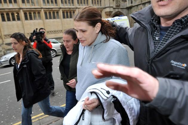 Louise Cox, 35, leaves Bristol Crown Court where she admitted providing police with a false name and description when she was asked to identify who had been driving her car which, driven by Nicky Lovell, hit and killed a couple as they rode their tandem b