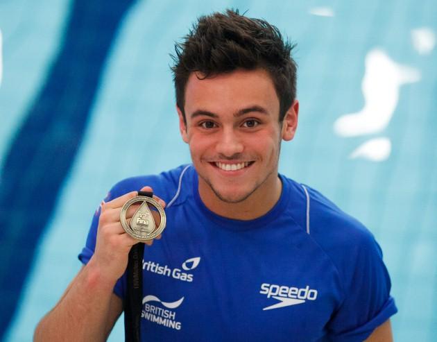 Great Britain's Tom Daley with his gold medal after victory in the Men's 10m Platform during the FINA Diving World Series at the Royal Commonwealth Pool, Edinburgh.
Picture date: Sunday April 21, 2013.