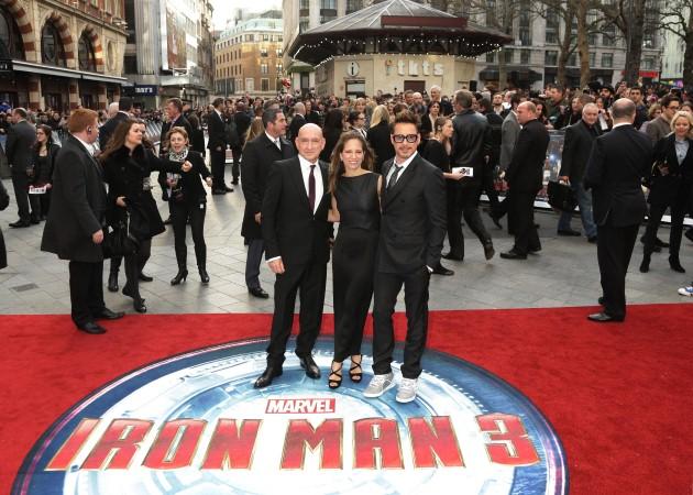 Sir Ben Kingsley, Susan Downey and Robert Downey Jr arriving for the premiere of Iron Man 3 at the Odeon Leicester Square, London.
Picture date: Thursday April 18, 2013.