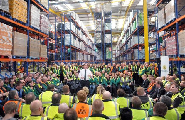 Prime Minister David Cameron speaks to workers at the Morrisons Distribution Centre in Bridgewater, Somerset as he goes on the local election campaign trail.
Picture date: Monday April 29, 2013.