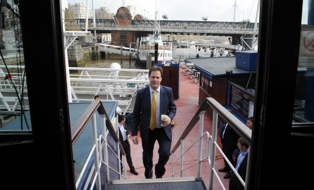 Deputy Prime Minister Nick Clegg arrives to co-host his weekly phone in radio show with LBC's Nick Ferrari on the moored boat the Tattersall Castle on the River Thames in London, where he was questioned by voters.
Picture date: Wednesday May 1, 2013.