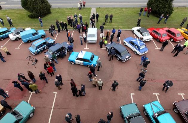 Car enthusiasts view Hillman Imp cars as they prepare to leave by convoy the site of the former factory in Linwood to mark the 50th anniversary of the first Hillman Imp car made at the Rootes car plant.
Picture date: Thursday May 2, 2013. 