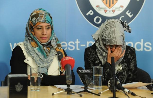 Shazia Khan (left) and Nazia Maqsood (right) attend a press conference at Lloyd House Police Headquarters, Birmingham to appeal for witnesses following the stabbing of their father Muhammed Saleem Chaudhry.
Picture date: Thursday May 2, 2013. Mohammed Sa
